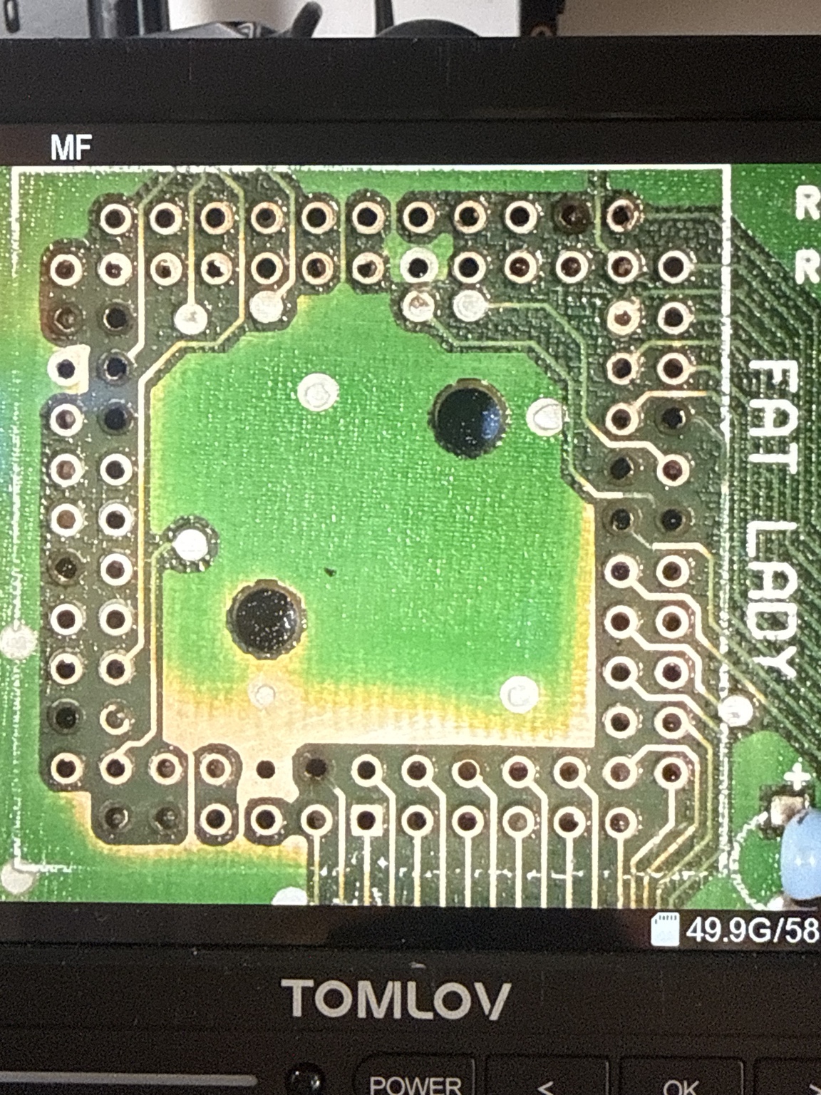 Close-up circuit board inspection during a repair