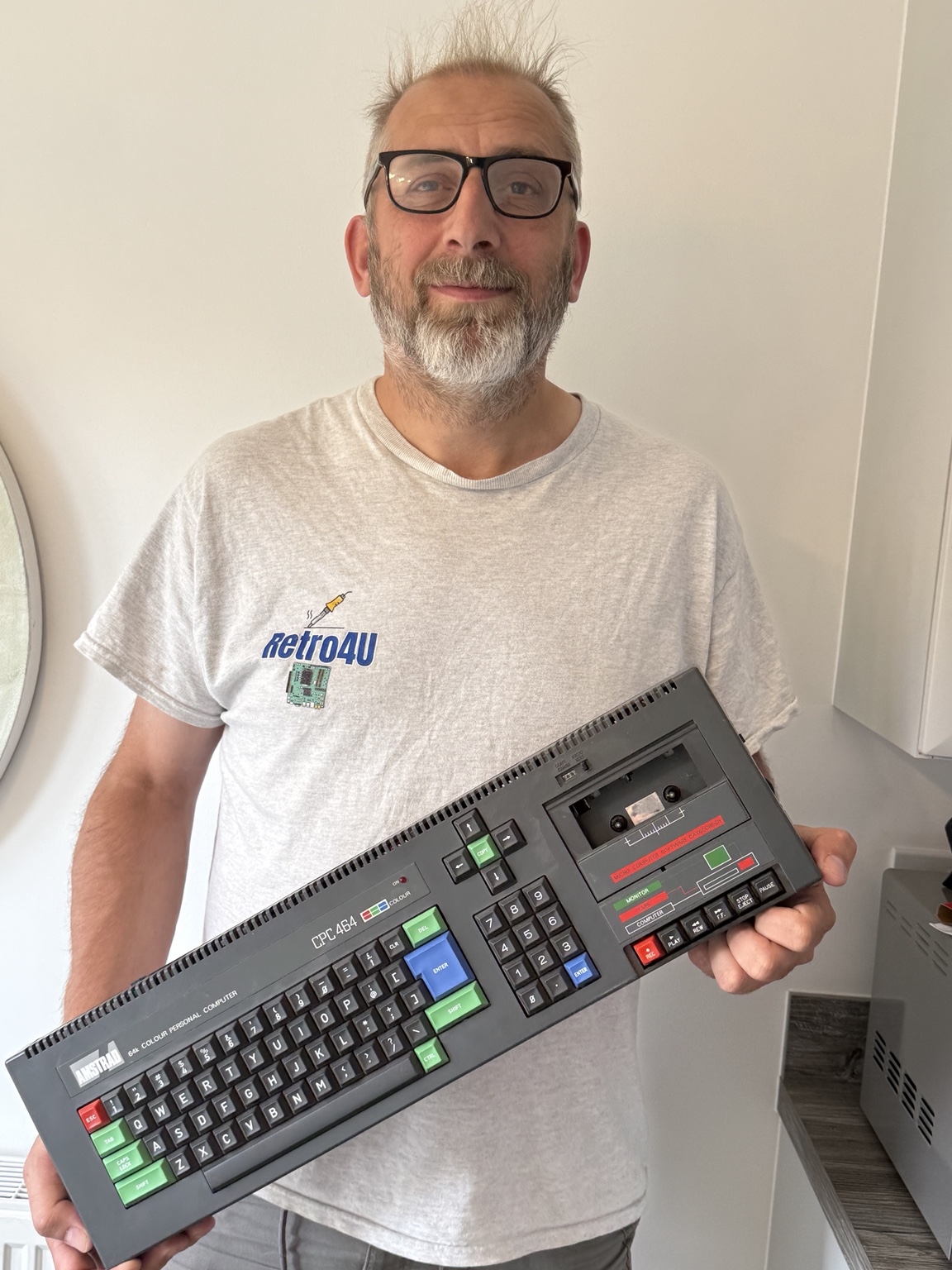 Neil from Retro4u holding an Amstrad CPC 464